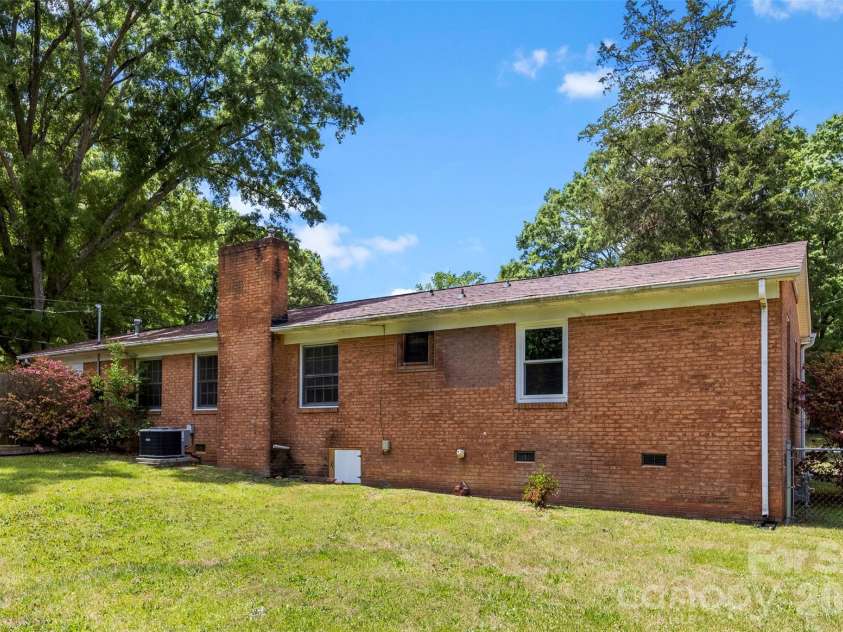8315 Westbourne Drive, Charlotte, NC 28216.  MLS# CAR4372262, YatesRealty ID 25304. Fully Gutted Brick Ranch
