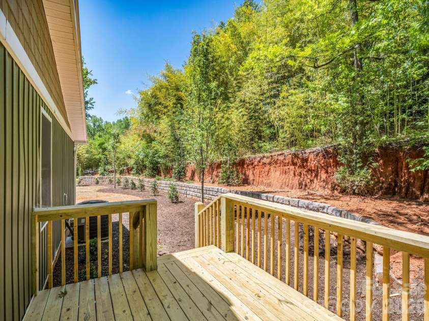 5923 Highway 14 Highway, Landrum, SC 29356.  MLS# CAR4386371, YatesRealty ID 25306. Back porch