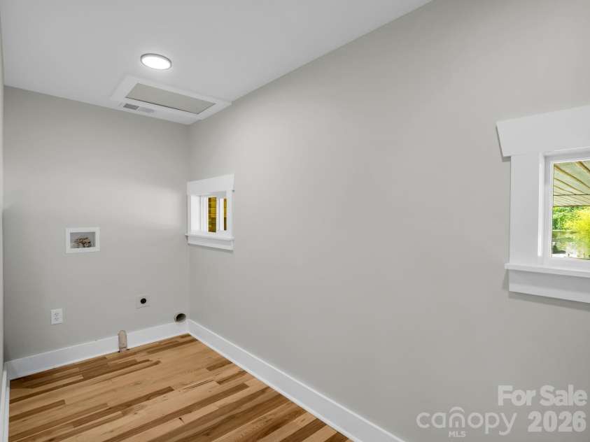 5923 Highway 14 Highway, Landrum, SC 29356.  MLS# CAR4386371, YatesRealty ID 25306. Laundry closet