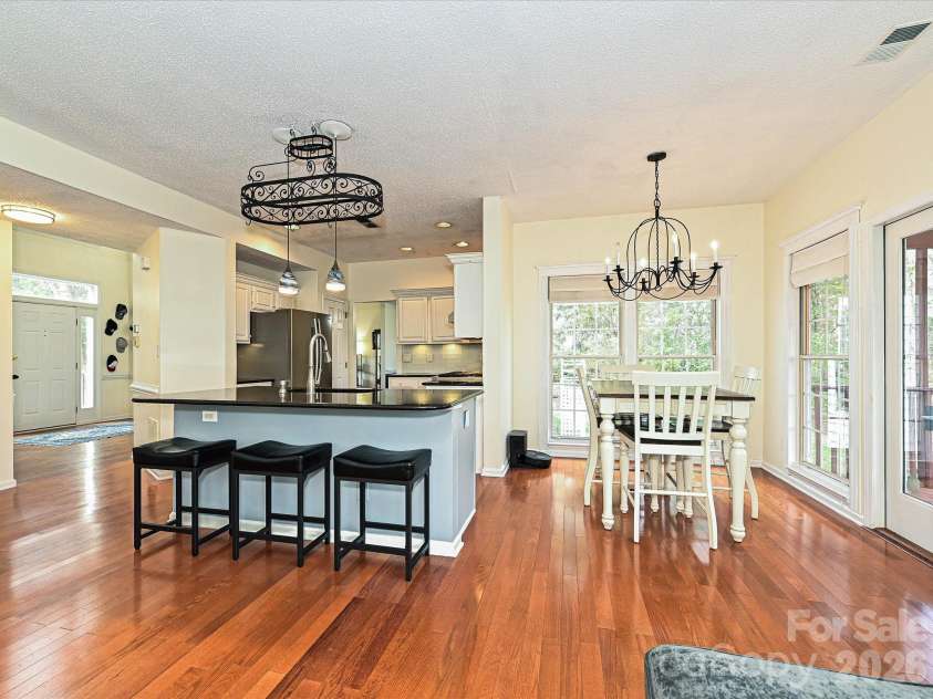 9027 Tayside Court, Huntersville, NC 28078.  MLS# CAR4349229, YatesRealty ID 25309. Kitchen and Breakfast view from the great room