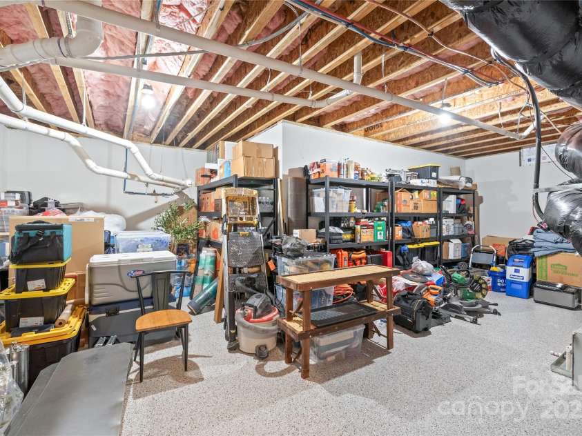 6320 Tilley Way, Matthews, NC 28105.  MLS# CAR4274022, YatesRealty ID 25314. Enjoy 442 sq ft of climate-controlled storage with epoxy floors—keeping your belongings safe, dry, and easily accessible all year long.
