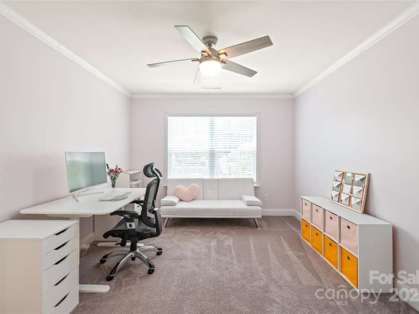 6320 Tilley Way, Matthews, NC 28105.  MLS# CAR4274022, YatesRealty ID 25314. Perfect for daily ease, Bedroom 2 offers a walk-in closet and personal sink in a shared Jack & Jill bathroom.
