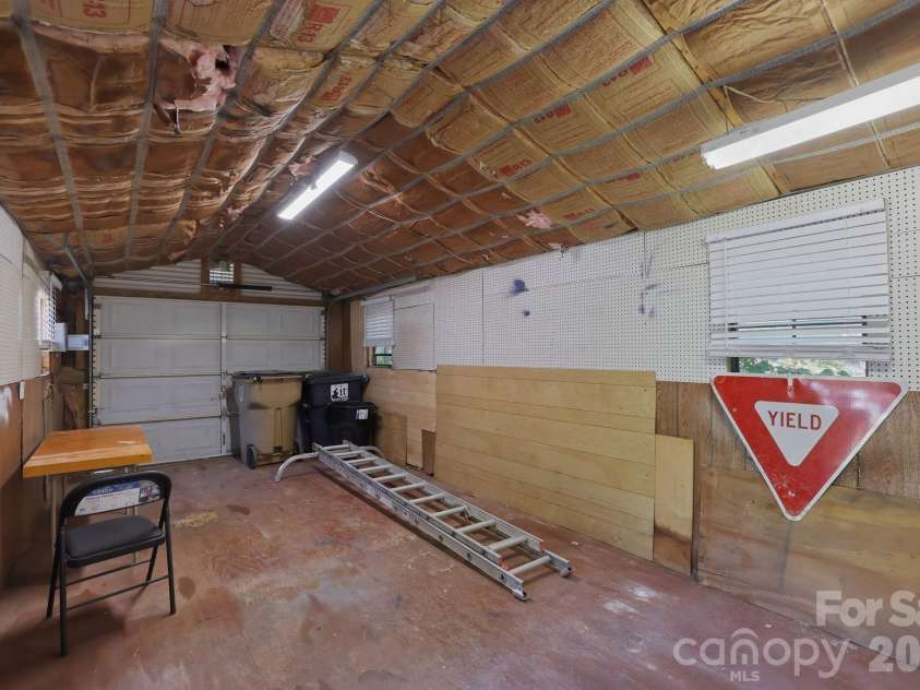 225 Middleton Avenue, Matthews, NC 28104.  MLS# CAR4379594, YatesRealty ID 25317. Storage shed with Power