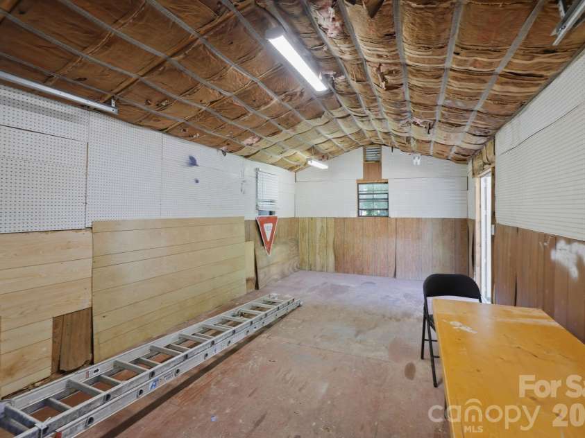 225 Middleton Avenue, Matthews, NC 28104.  MLS# CAR4379594, YatesRealty ID 25317. Storage shed with Power