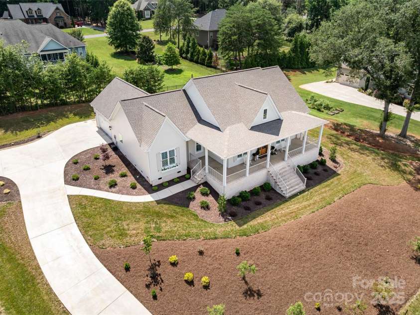 416 Yorkfield Drive, Shelby, NC 28150.  MLS# CAR4276918, YatesRealty ID 25318. Aerial View of Home with 2 car side load garage & fenced back yard, situated on .60 acre lot!