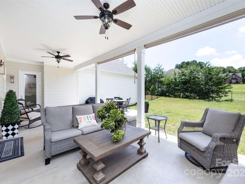 416 Yorkfield Drive, Shelby, NC 28150.  MLS# CAR4276918, YatesRealty ID 25318. Covered, Patio with dual ceiling fans & fenced back yard perfect for relaxing & activities!