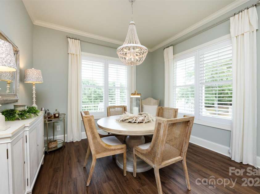 416 Yorkfield Drive, Shelby, NC 28150.  MLS# CAR4276918, YatesRealty ID 25318. Dining Area with plantation shutters, crown molding & custom chandelier!
