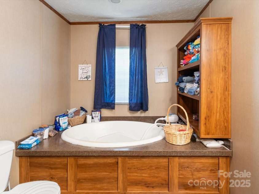 132 Bailey Mountain Road, Mars Hill, NC 28754.  MLS# CAR4288819, YatesRealty ID 2532. Master bath 