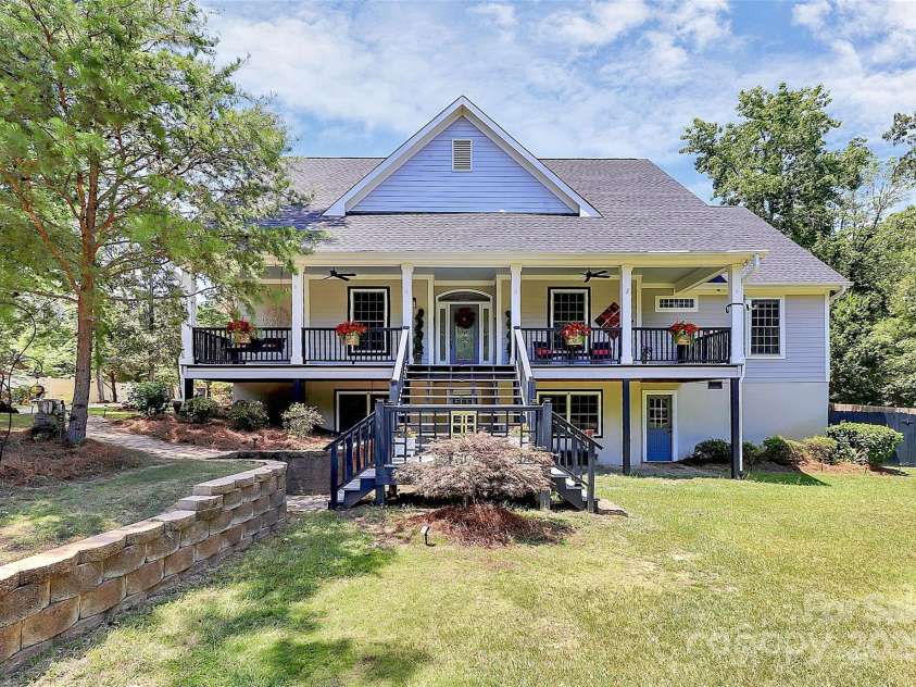 514 Bethel School Road, Clover, SC 29710.  MLS# CAR4278192, YatesRealty ID 25320. This Southern Living style home is situated on a peaceful 1 acre but 8 minutes away from shopping & groceries.