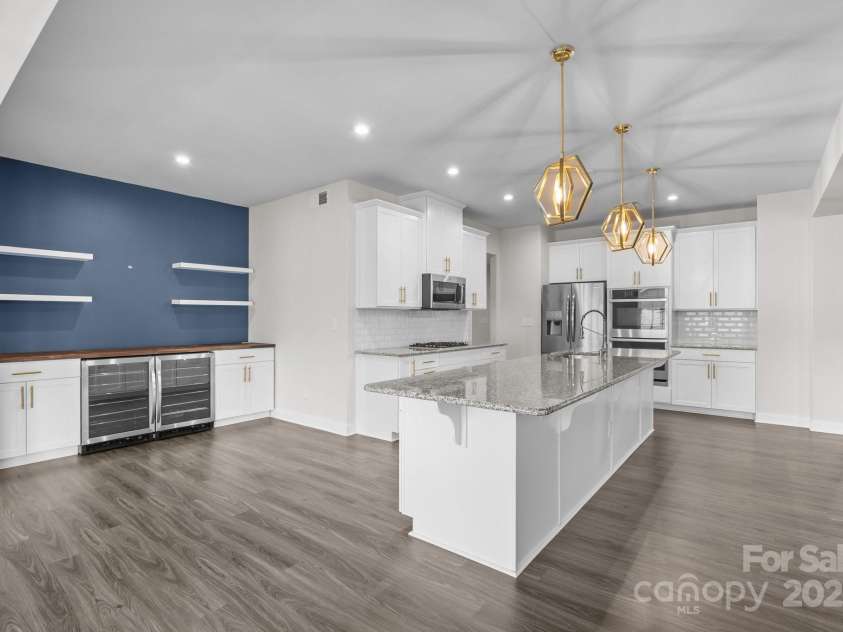 12710 ES Draper Drive, Huntersville, NC 28078.  MLS# CAR4245937, YatesRealty ID 25327. Large open kitchen with drybar