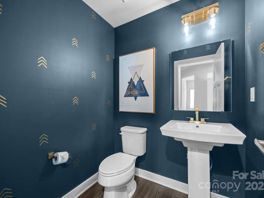 12710 ES Draper Drive, Huntersville, NC 28078.  MLS# CAR4245937, YatesRealty ID 25327. Moody downstairs powder room