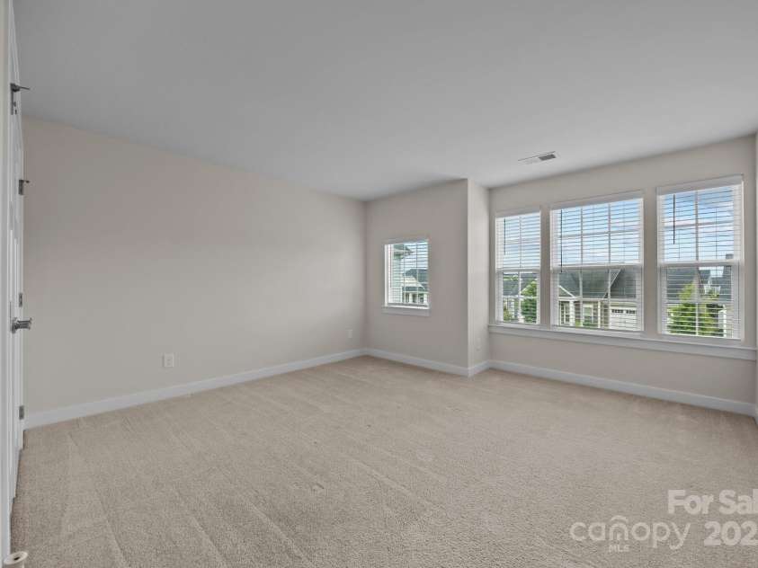 12710 ES Draper Drive, Huntersville, NC 28078.  MLS# CAR4245937, YatesRealty ID 25327. Secondary bedroom