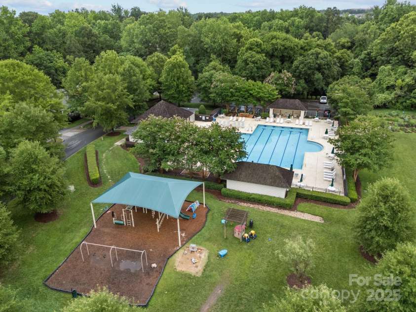 12710 ES Draper Drive, Huntersville, NC 28078.  MLS# CAR4245937, YatesRealty ID 25327. The other community pool is closer to the neighborhood center and also has a playground