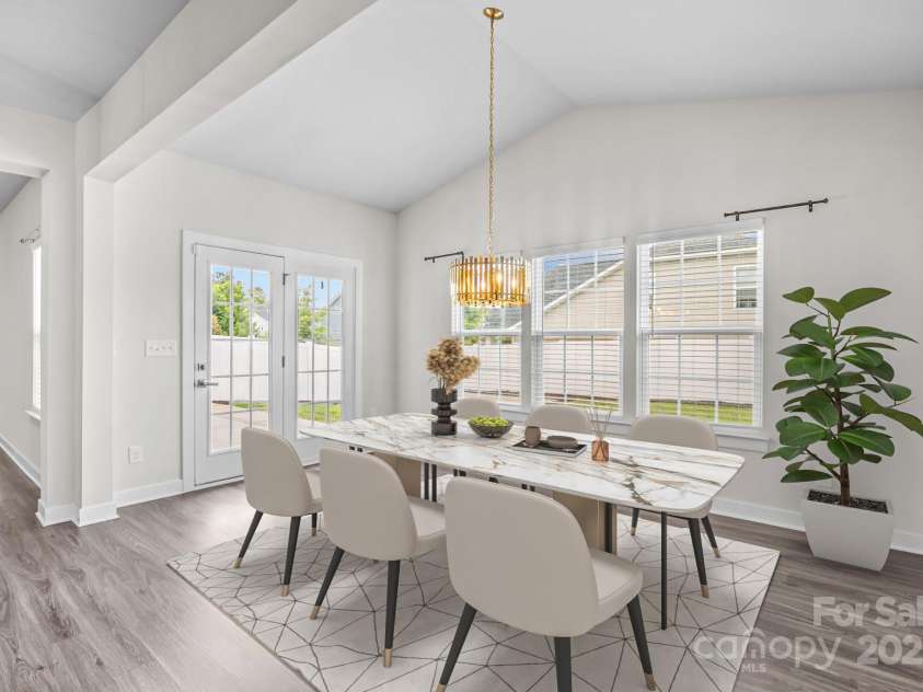 12710 ES Draper Drive, Huntersville, NC 28078.  MLS# CAR4245937, YatesRealty ID 25327. Virtual staging of the morning room. Plenty of space to be the one dining room in the house