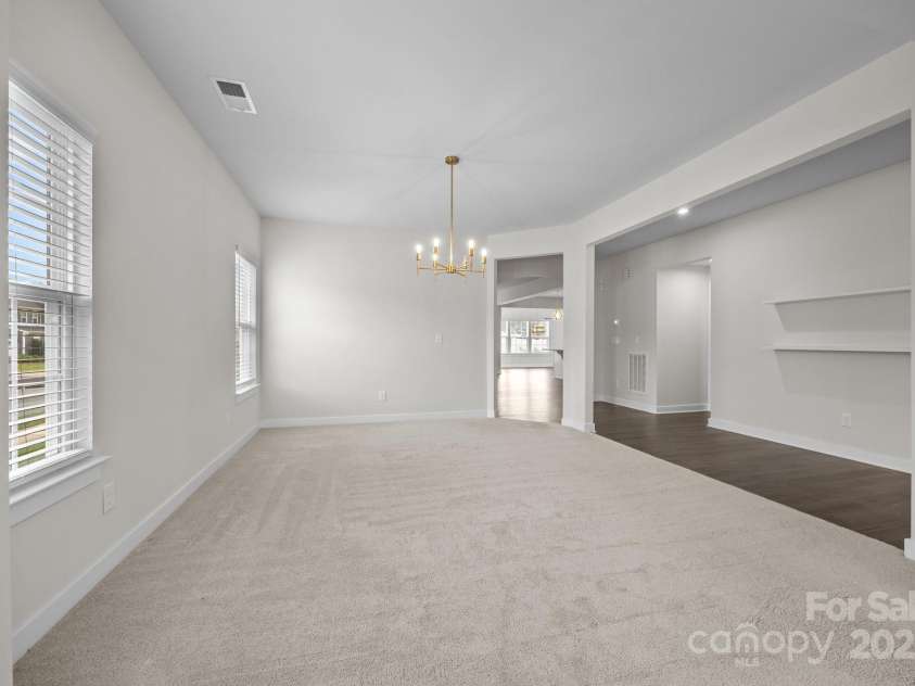 12710 ES Draper Drive, Huntersville, NC 28078.  MLS# CAR4245937, YatesRealty ID 25327. Yes, the manufacturer does still make the matching LVP if you wanted to remove the carpet