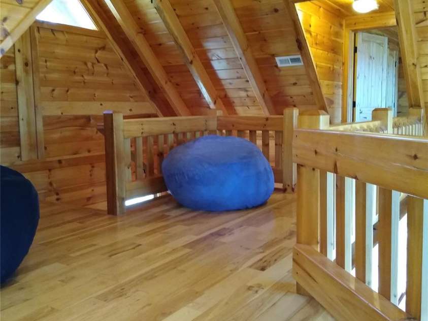 109 Overlook Point Lane, Lake Lure, NC 28746.  MLS# CAR4336925, YatesRealty ID 2533. Open loft