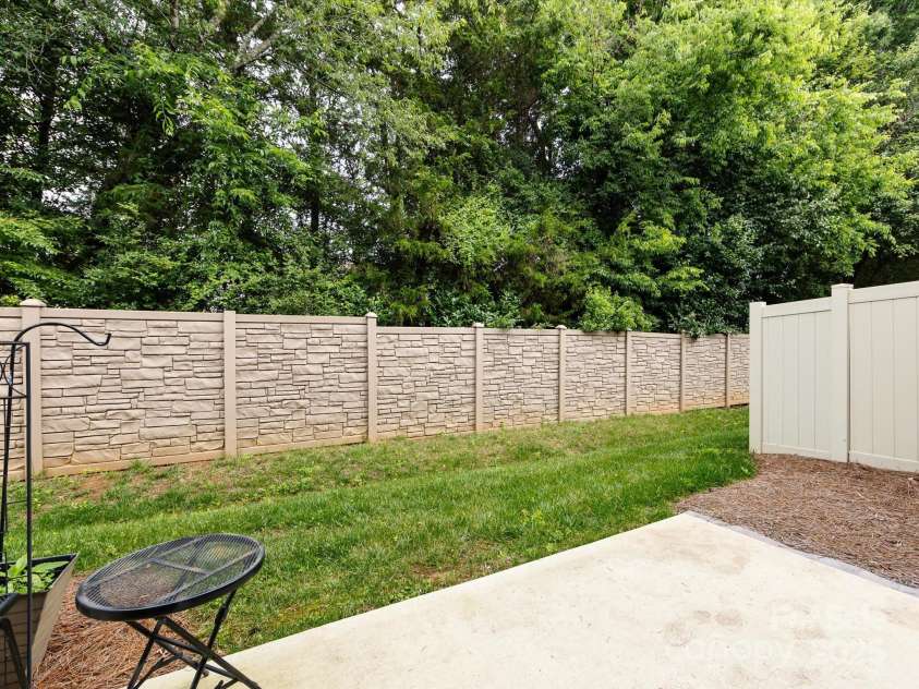 403 Park Meadows Drive, Matthews, NC 28104.  MLS# CAR4263302, YatesRealty ID 25331. Rear view from Patio