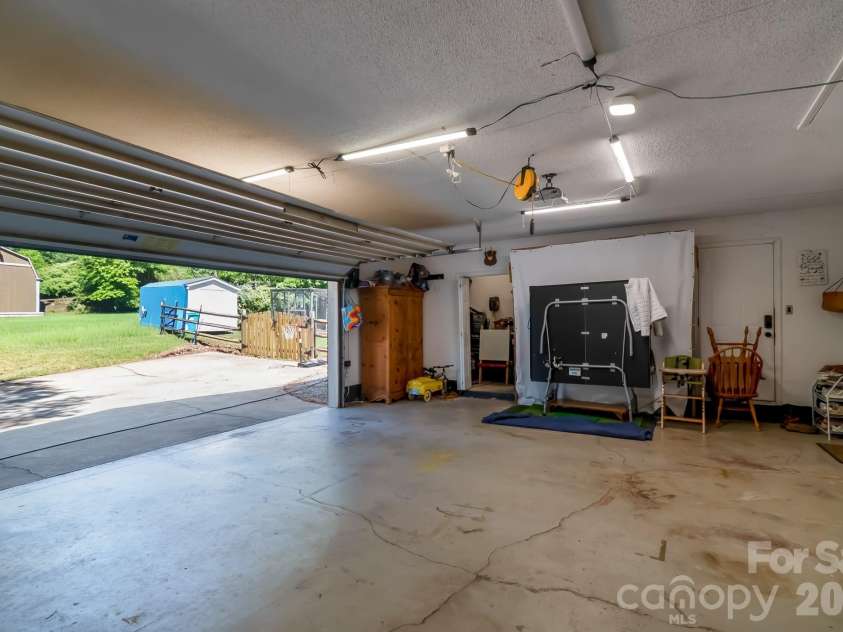 6070 Ferncliff Drive, Concord, NC 28027.  MLS# CAR4371850, YatesRealty ID 25333. Garage closet space.