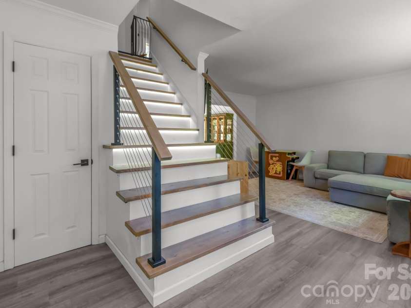 6070 Ferncliff Drive, Concord, NC 28027.  MLS# CAR4371850, YatesRealty ID 25333. Staircase lighting.
