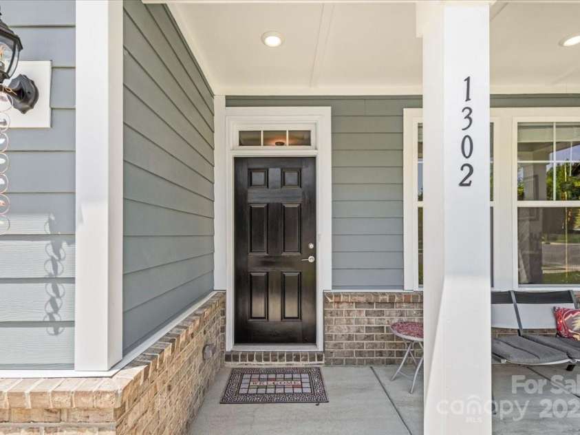 1302 Black Walnut Street, Monroe, NC 28112.  MLS# CAR4277841, YatesRealty ID 25335. Front porch