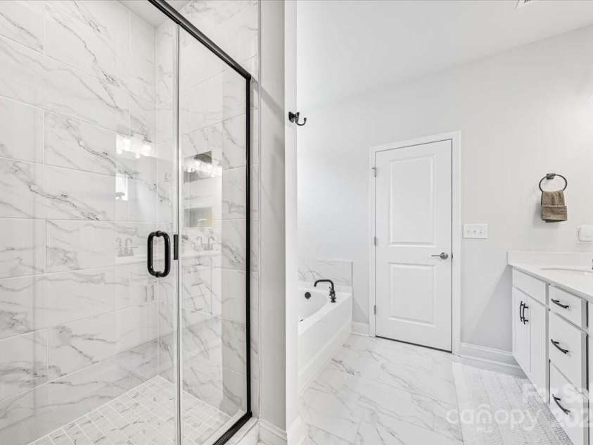 1302 Black Walnut Street, Monroe, NC 28112.  MLS# CAR4277841, YatesRealty ID 25335. Primary Bath