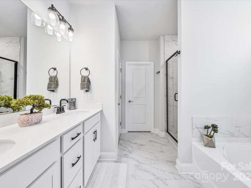 1302 Black Walnut Street, Monroe, NC 28112.  MLS# CAR4277841, YatesRealty ID 25335. Primary Bath with Tub and sep. shower