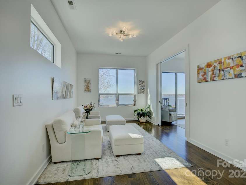 7111 Anchorage Lane, Tega Cay, SC 29708.  MLS# CAR4224144, YatesRealty ID 2534. 2nd floor sitting area by the primary bedroom