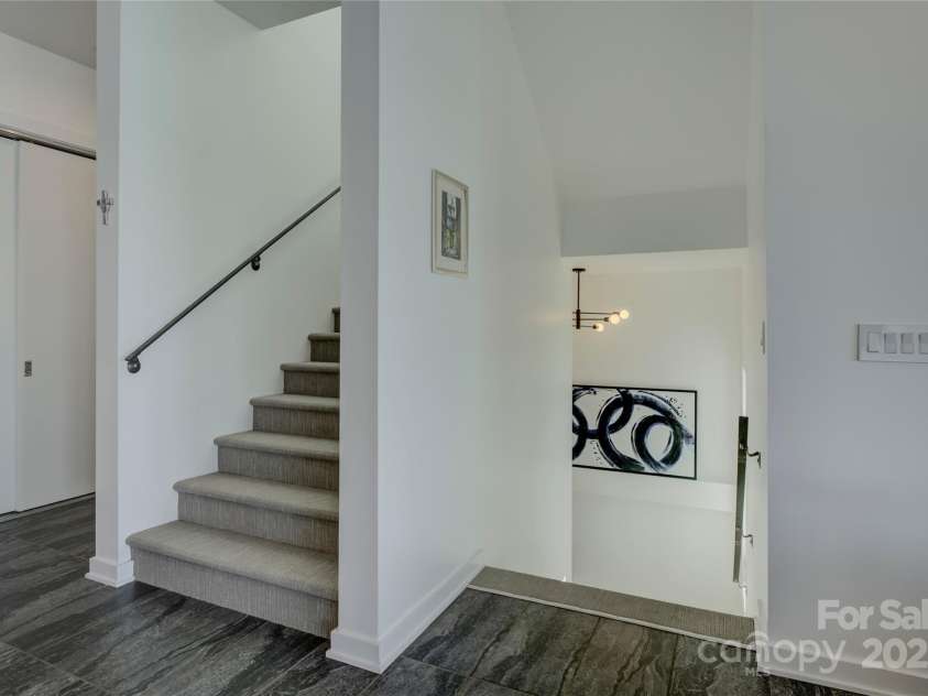 7111 Anchorage Lane, Tega Cay, SC 29708.  MLS# CAR4224144, YatesRealty ID 2534. From upper to lower level