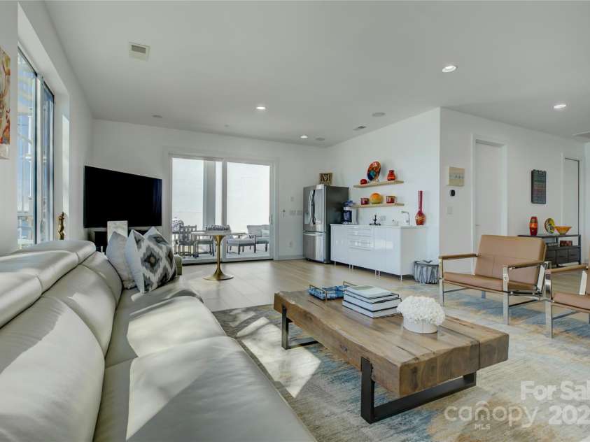 7111 Anchorage Lane, Tega Cay, SC 29708.  MLS# CAR4224144, YatesRealty ID 2534. Lower level living room area