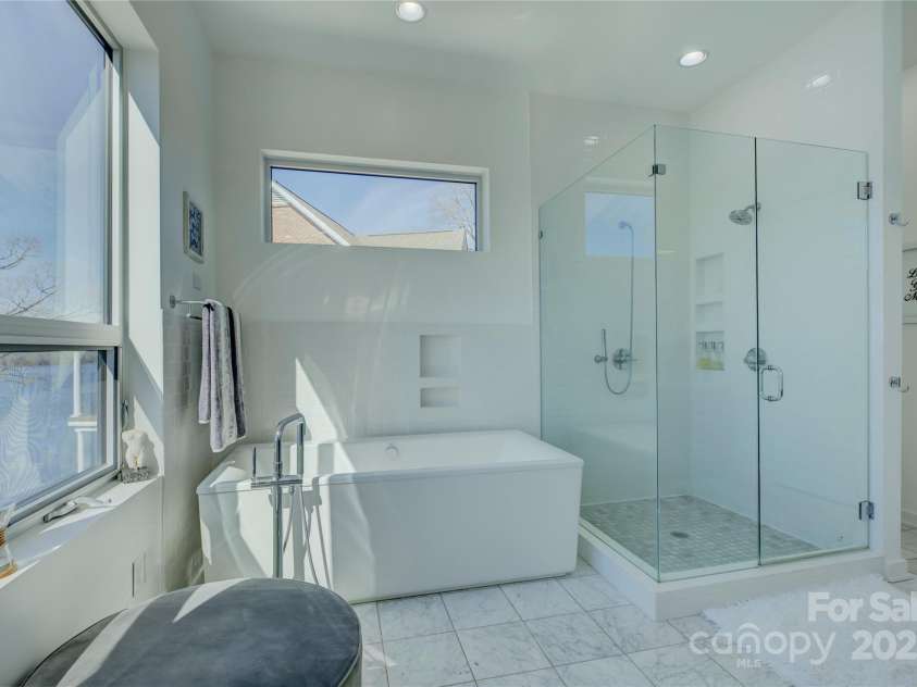 7111 Anchorage Lane, Tega Cay, SC 29708.  MLS# CAR4224144, YatesRealty ID 2534. Primary bath with open water views of Lake Wylie