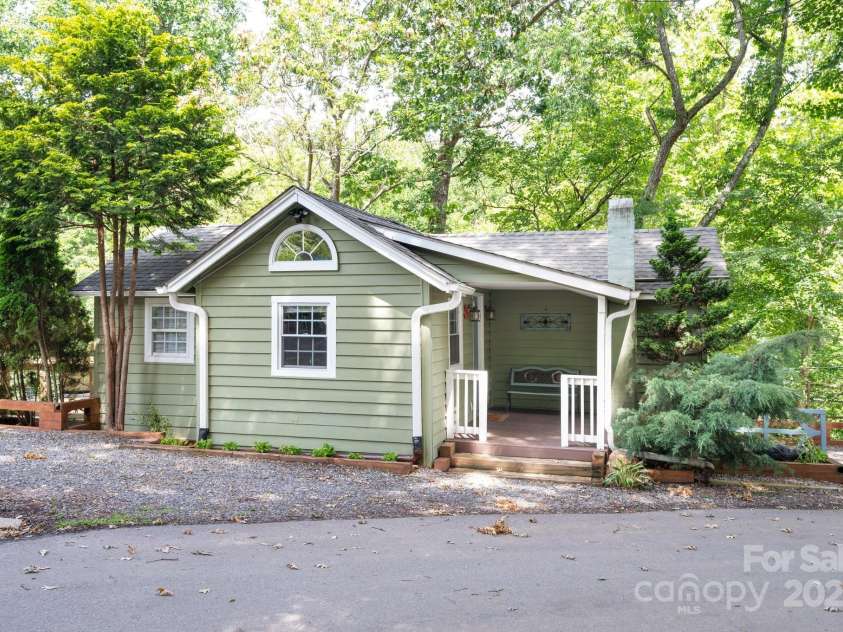 5 Arbutus Road, Asheville, NC 28805.  MLS# CAR4270691, YatesRealty ID 25344. Charming East Asheville Cottage with Additional Apartment