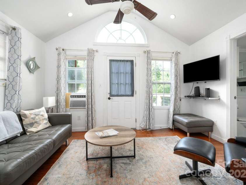 5 Arbutus Road, Asheville, NC 28805.  MLS# CAR4270691, YatesRealty ID 25344. Living Room with Vaulted Ceiling