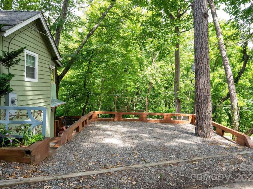 5 Arbutus Road, Asheville, NC 28805.  MLS# CAR4270691, YatesRealty ID 25344. Parking for Lower Level Unit