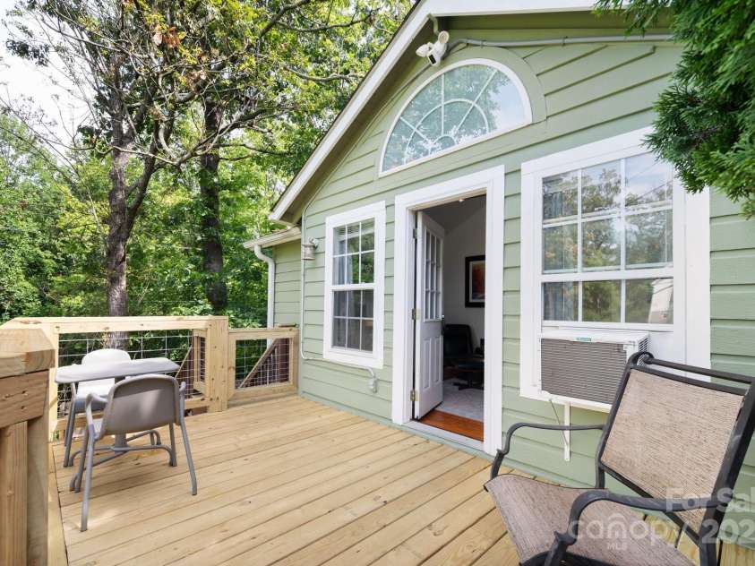 5 Arbutus Road, Asheville, NC 28805.  MLS# CAR4280642, YatesRealty ID 25344. Access the Deck from the Living Room