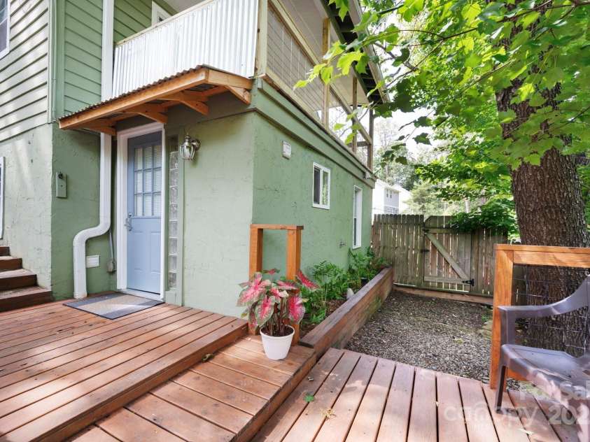 5 Arbutus Road, Asheville, NC 28805.  MLS# CAR4280642, YatesRealty ID 25344. Lower Unit Entrance and Sitting Area