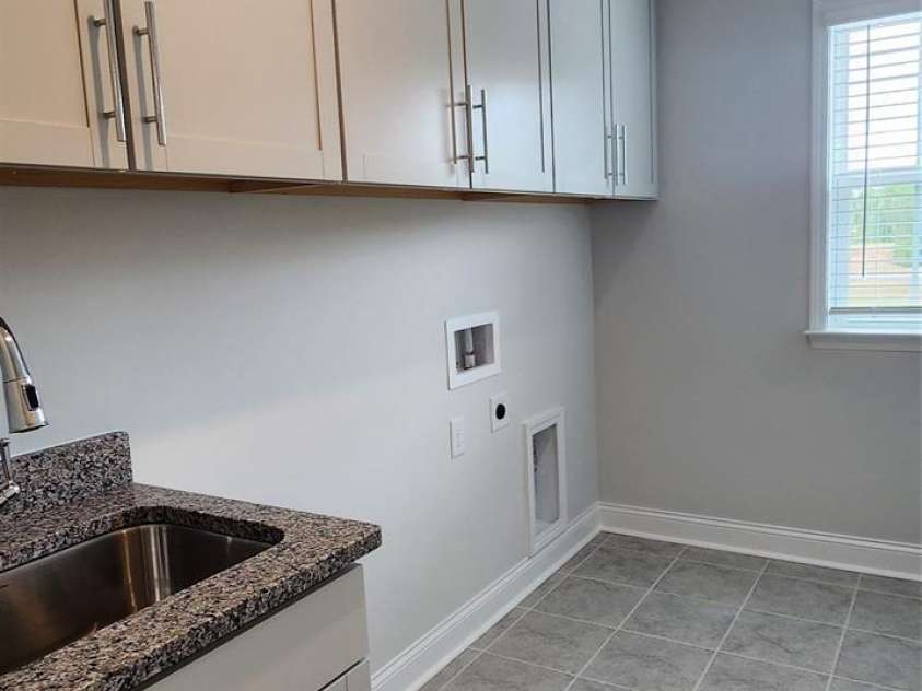 885 Regulus Court, York, SC 29745.  MLS# CAR4259352, YatesRealty ID 25348. Laundry Room with Laundry Sink and Plenty of Cabinets