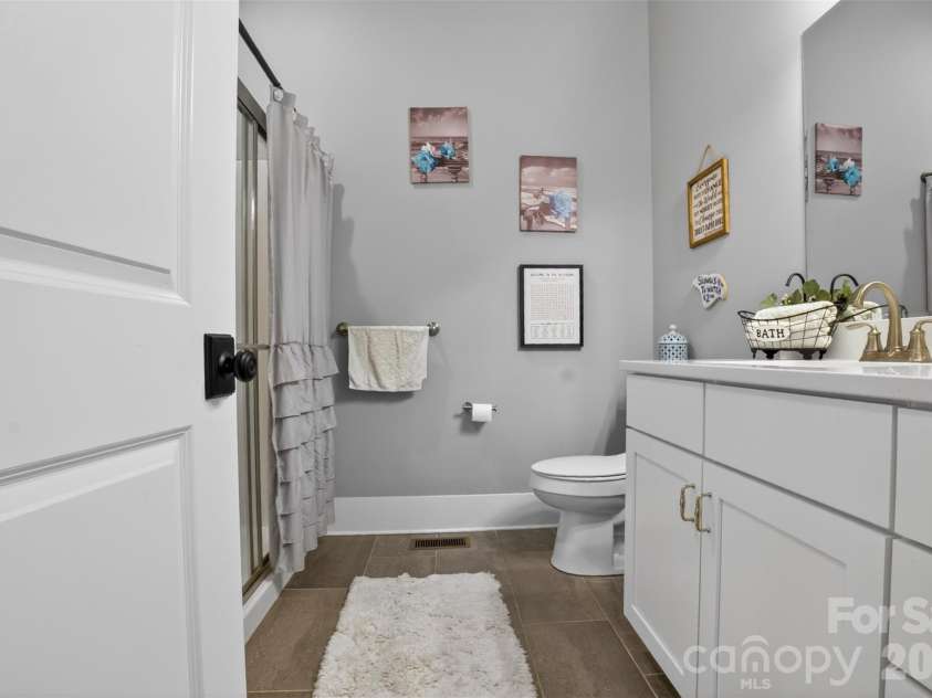5811 Kristi Lane, Midland, NC 28107.  MLS# CAR4365681, YatesRealty ID 25349. Downstairs Bath