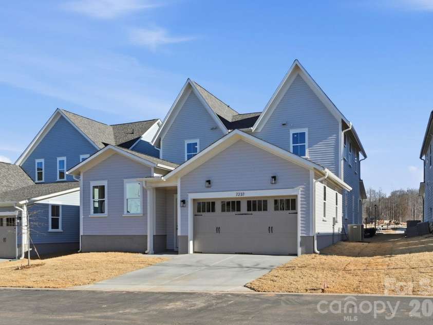 7237 Westrow Avenue, Charlotte, NC 28278.  MLS# CAR4311743, YatesRealty ID 2535. Rear load 2 car garage and low maintenance yard. Walkable from River District amenities. 