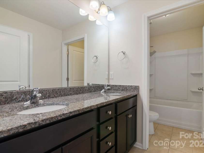 12704 Franklin Square Road, Charlotte, NC 28213.  MLS# CAR4274757, YatesRealty ID 25351. Hallway Full Bathroom with Dual Vanity!