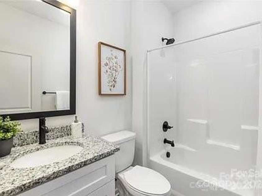 1604 Main Street, Mount Holly, NC 28120.  MLS# CAR4258910, YatesRealty ID 25353. Main bath