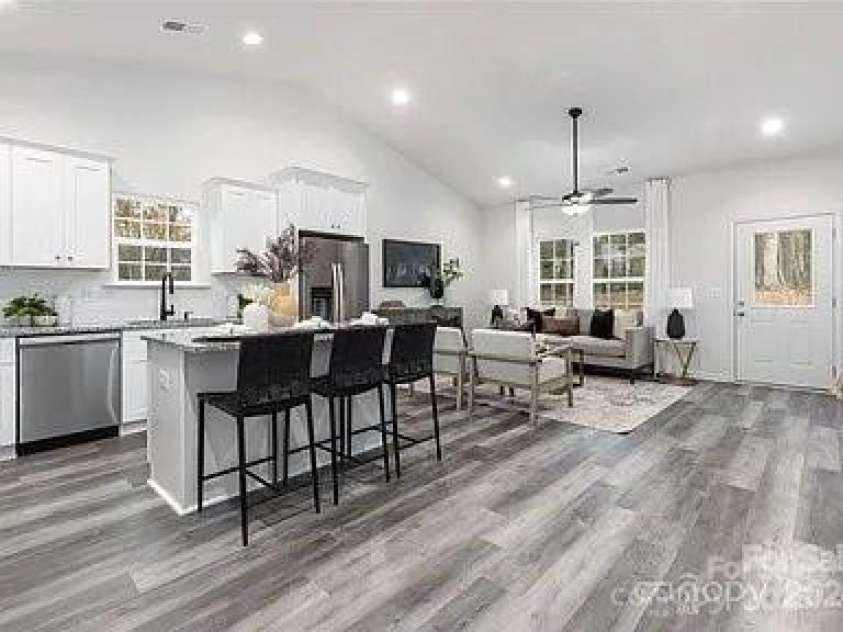 1604 Main Street, Mount Holly, NC 28120.  MLS# CAR4258910, YatesRealty ID 25353. Staged kitchen to family room