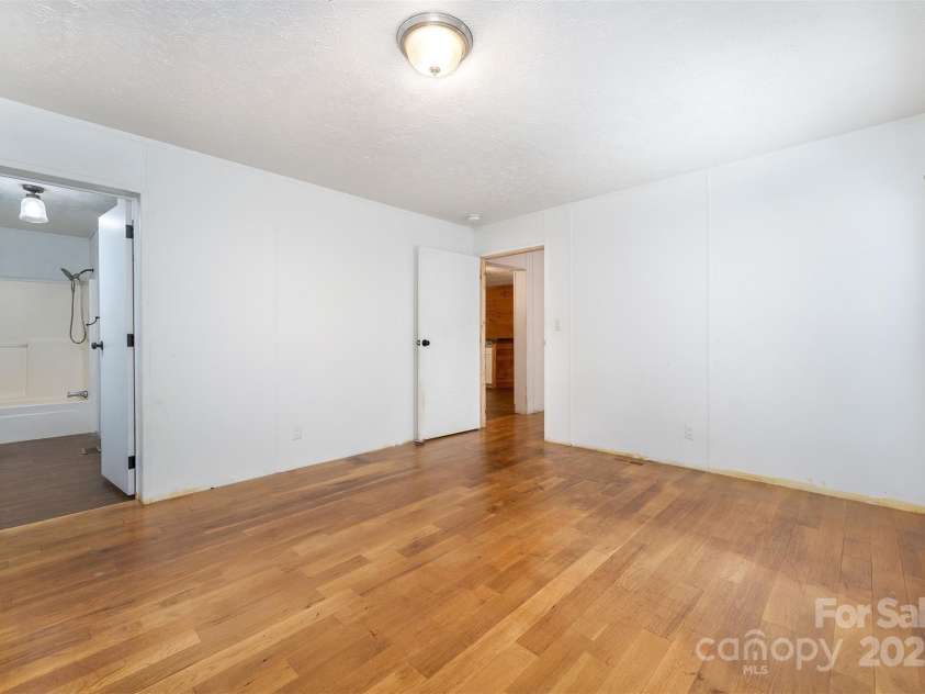 116 Hidden Meadow Drive, Candler, NC 28715.  MLS# CAR4258424, YatesRealty ID 25356. Primary Bedroom