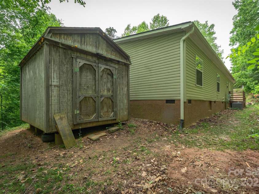 116 Hidden Meadow Drive, Candler, NC 28715.  MLS# CAR4258424, YatesRealty ID 25356. Rear Exterior
