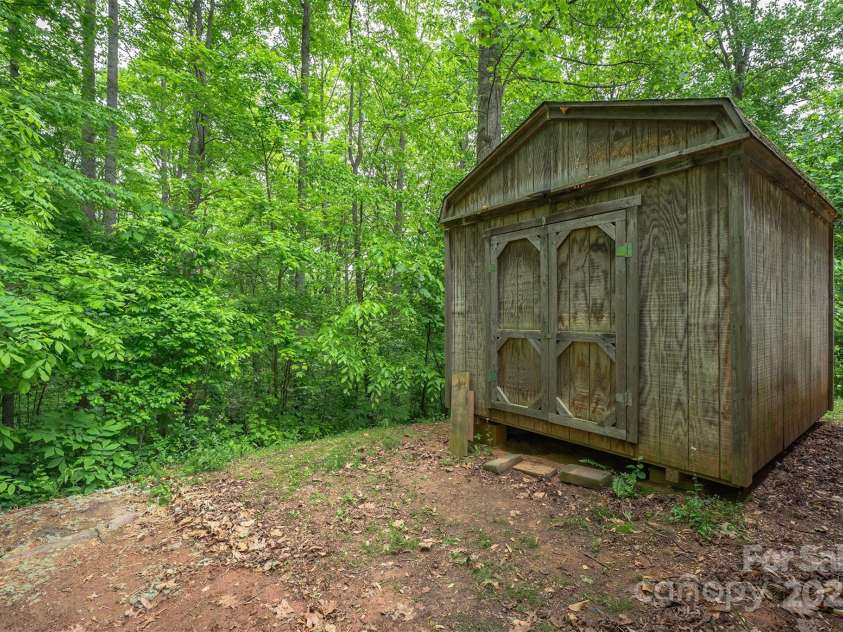 116 Hidden Meadow Drive, Candler, NC 28715.  MLS# CAR4258424, YatesRealty ID 25356. Storage Building