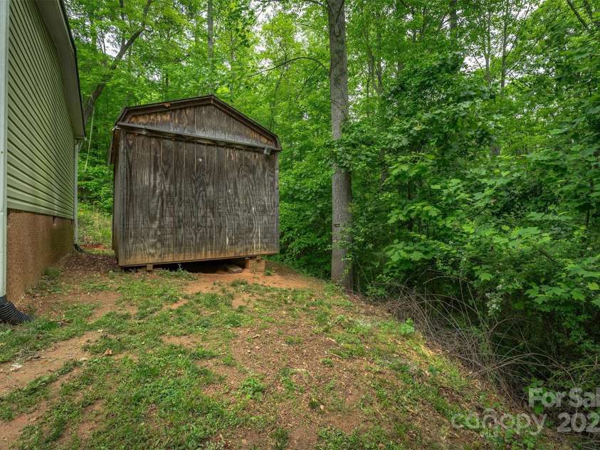 116 Hidden Meadow Drive, Candler, NC 28715.  MLS# CAR4258424, YatesRealty ID 25356. Storage Building