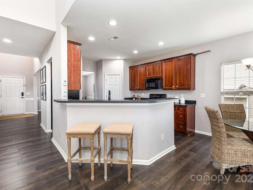 10198 Tintinhull Drive, Indian Land, SC 29707.  MLS# CAR4265539, YatesRealty ID 25357. Breakfast bar that is easily accessible from the Great Room & Breakfast Area!