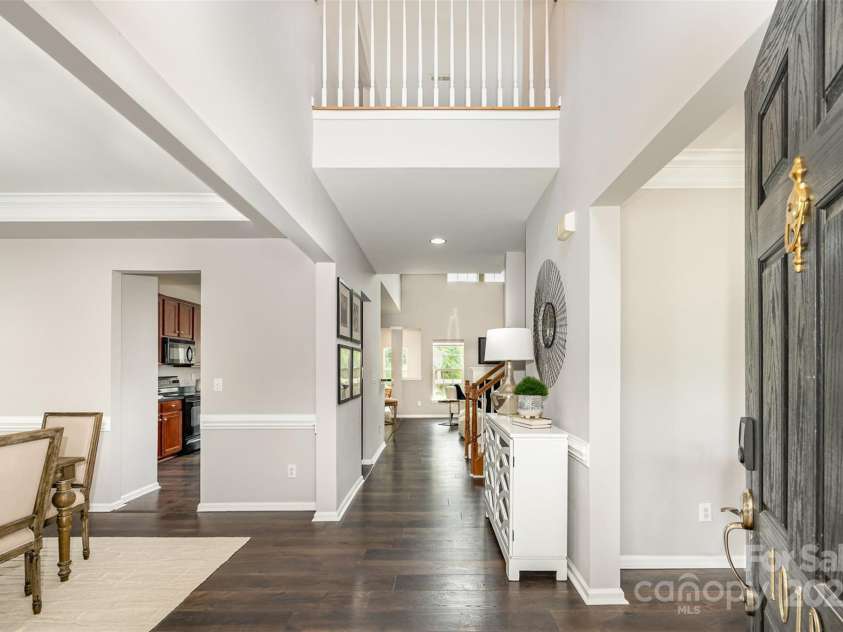 10198 Tintinhull Drive, Indian Land, SC 29707.  MLS# CAR4265539, YatesRealty ID 25357. Impressive 2-story foyer, Excellent Open Floor Plan, LVP Throughout 1st Fl, Loads of Windows & Light!  Home has a Brand New 3-Zone System for your HVAC was just installed May of 2025, that Controls Costs Efficient