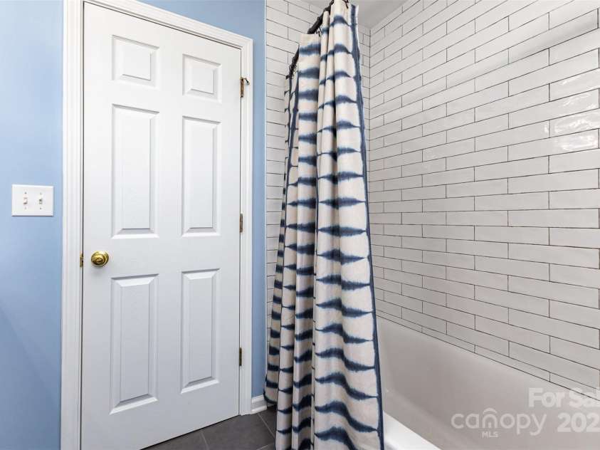 10198 Tintinhull Drive, Indian Land, SC 29707.  MLS# CAR4265539, YatesRealty ID 25357. Shower/tub combo view.