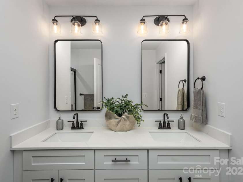 2008 Sadler Woods Lane, Charlotte, NC 28214.  MLS# CAR4233955, YatesRealty ID 2536. Double vanity. Representative Photo