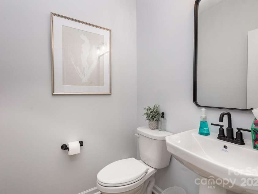 2008 Sadler Woods Lane, Charlotte, NC 28214.  MLS# CAR4233955, YatesRealty ID 2536. Half bath. Representative Photo